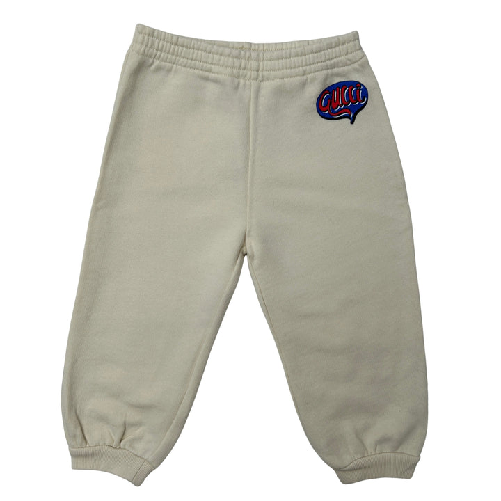 GUCCI LOGO PATCH JOGGERS – CREAM – 18-24 MONTHS